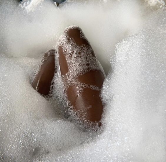 black legs in a bubble bath